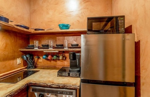 Virgin RV Rental | Luxurious Cliff Dwelling W/hot tub and King Bed ADA accessible