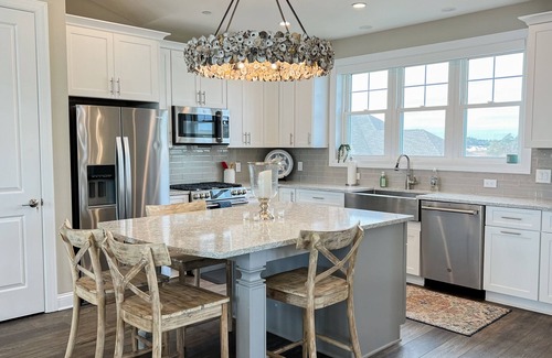 Ocean City House | Luxurious coastal getaway with multiple balconies, patio, & stunning ocean views
