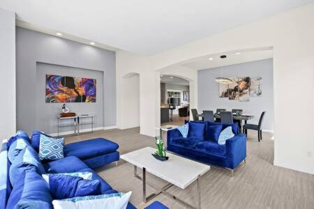 Indio House | Luxurious Getaway Near Coachella Stagecoach Pool Putting Green Parking Firepit Sleeps 11