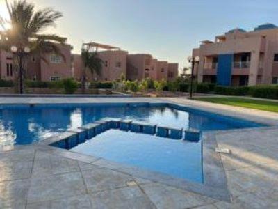 Zafarana Apartment | Luxurious ground chalet with a private garden and pool view.