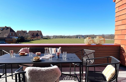 Hohwacht Apartment | Luxurious loft apartment with rooftop terrace and fireplace