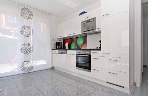 Greetsiel Apartment | Luxurious, modern apartment with fireplace and terrace