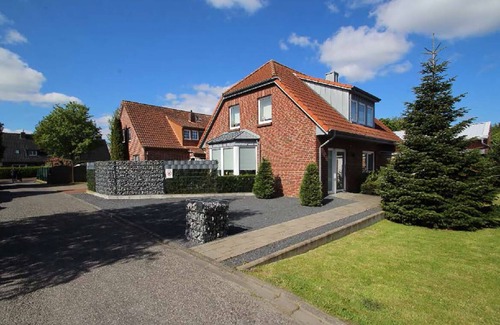 Greetsiel Apartment | Luxurious, modern apartment with fireplace and terrace