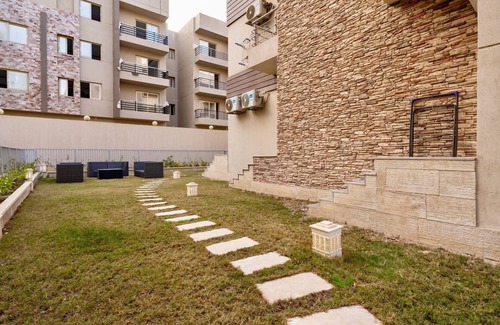 New Cairo Apartment | luxury 3-bedroom with private garden,shared pools in midtown compound, New Cairo