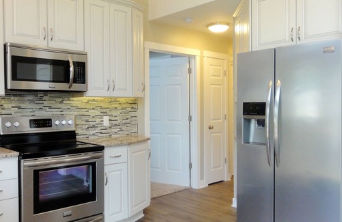 Shelbyville House | Luxury 4 bed, 2.5 bath Gun Lake Waterfront Home w/paddleboards/kayaks, free wifi