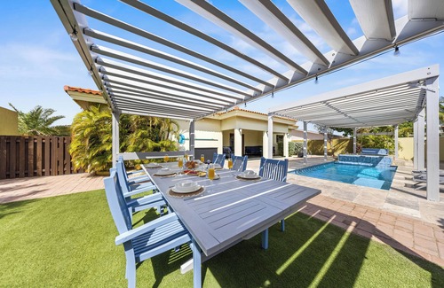Opal Villa | Luxury 4br home just 0.5 miles from the beach, pool, jacuzzi, BBQ, and gym!