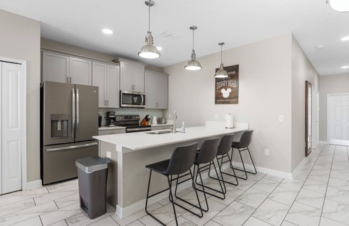 Kissimmee House | Luxury 5 BR at Disney Universal free heated pool high chair stroller playpen