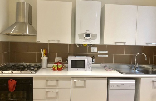 Barriera Vecchia-San Giacomo Apartment | Luxury apartment in a pedestrian area. Cinema theaters and a corner of history.