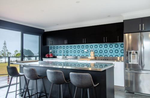 Eden House | Luxury Beachfront Waves, Sand & Wine Nights