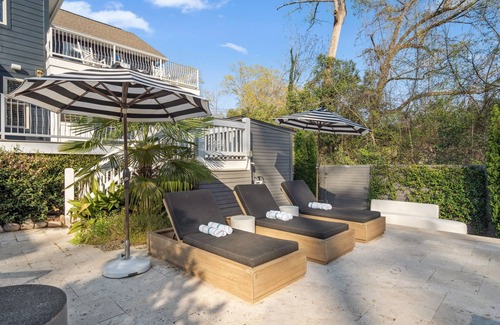 Commonwealth Park House | Luxury Charlotte Home with Stunning Pool & Hot Tub & Waterfalls