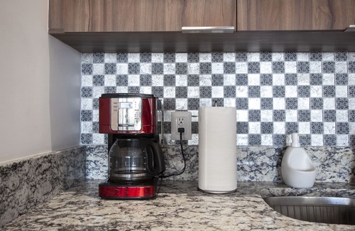 Emiliano Zapata Condo | LUXURY CONDOMINIUM THREE BLOCKS FROM THE BEACH.