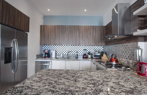 Emiliano Zapata Condo | LUXURY CONDOMINIUM THREE BLOCKS FROM THE BEACH.