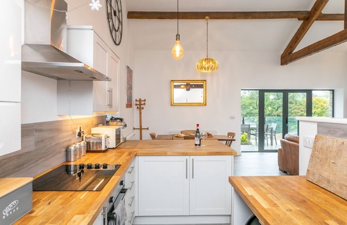 High Bentham Cottage | Luxury cottage - river views, balcony and hot tub