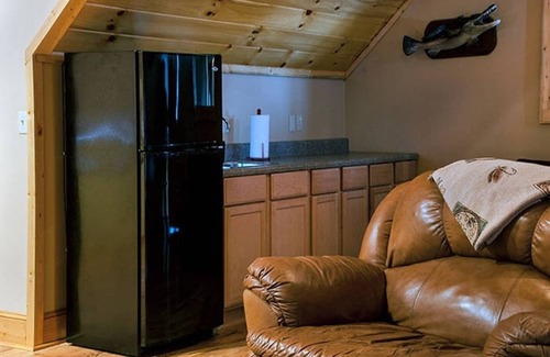 Bryson City Cabin | Luxury Creekside Lodge with Hot Tub & Game Room, Great for Large Groups!