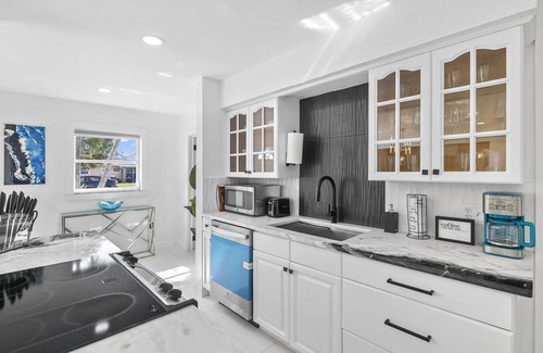 Fort Myers House | Luxury family friendly WATERFRONT home with a POOL, PLAYGROUND, FIREPIT & BEACH