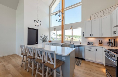 Waterfront Greens House | Luxury Lake Escape w/Lake Access & Indoor Pool