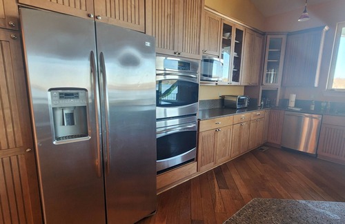 Mineral House | luxury living on Lake Anna! volleyball, outdoor kitchen, waterfront, firepit