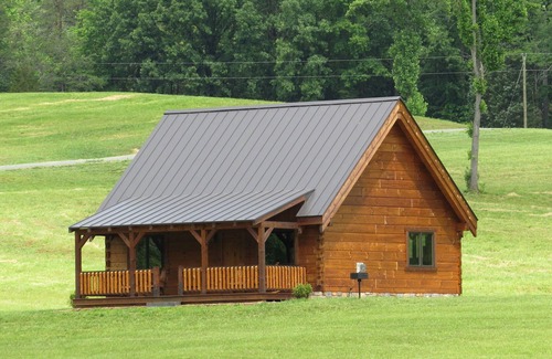 Nellysford Cabin | Luxury Log cabin on private lake. Pet Friendly!