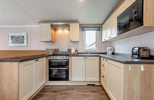 Ringwood House | Luxury Modern Family Lodge with Pools, Linen & Activity Pass in Award-Winning Holiday Park