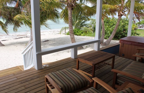 Cherokee House | Luxury Oceanfront with HOT TUB - BOAT, kayaks, paddleboards included -PARADISE!