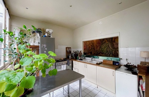 Saint-Vincent-de-Paul Apartment | Magnificent, Bright Haussmann Apartment Decorated by a Designer