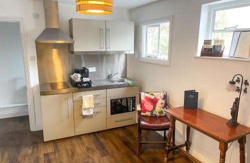 Kew Hotel | Maids Guest Rooms