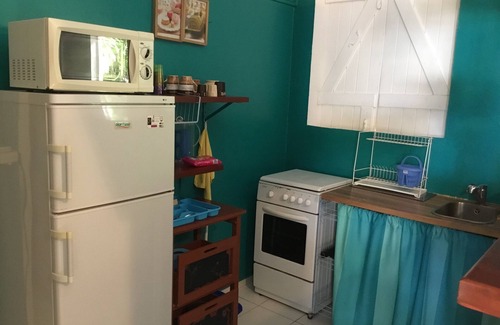 Sainte-Anne House | Maison des sables, "Ash blue" and "orange"