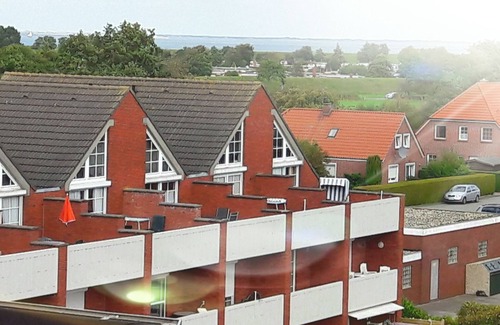 Dornum Apartment | Maisonette apartment - 17m² balcony - Garage for bicycles - Free WLAN -