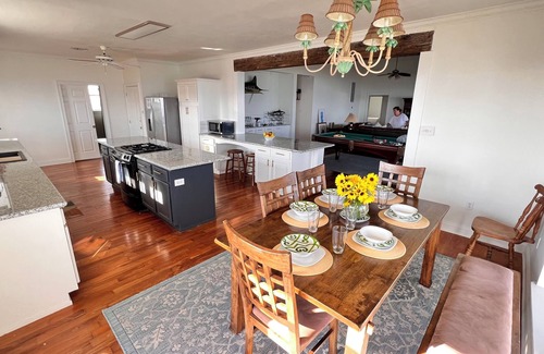 Grand Isle House | Majestic bayfront home. 450’ pier w/boat access, crabbing, fishing, & swimming.