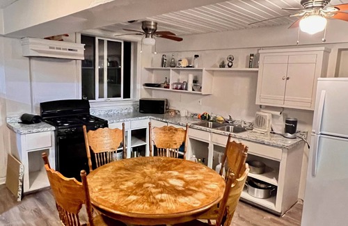 Grand Isle House | Majestic bayfront home. 450’ pier w/boat access, crabbing, fishing, & swimming.