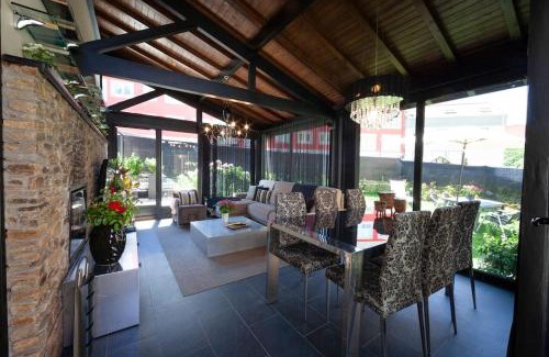 Mino House | Maravillosa vivienda con jardín y barbacoa.