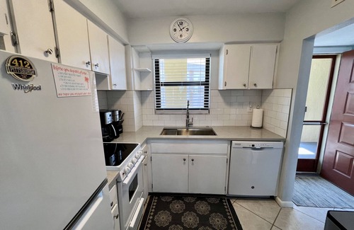 Marco Island Condo | MarcoView 402 - A Slice of Paradise! Premier Waterfront Location @Anglers Cove!