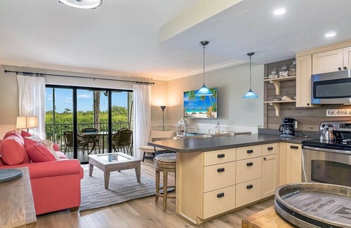 Captiva House | Marina views, heated pool, hot tub, short walk to the beach
