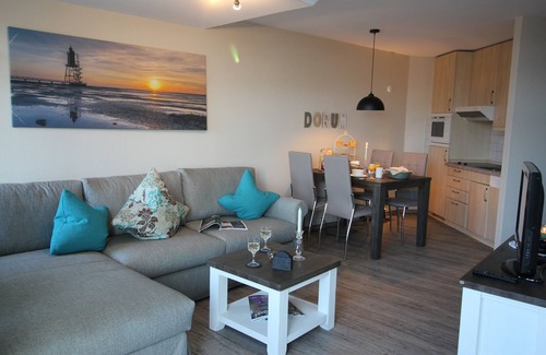 Dorumer Neufeld Apartment | Maritime country house style with sea view - swimming pool, sauna & WLAN included