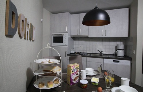 Dorumer Neufeld Apartment | Maritime country house style with sea view - swimming pool, sauna & WLAN included