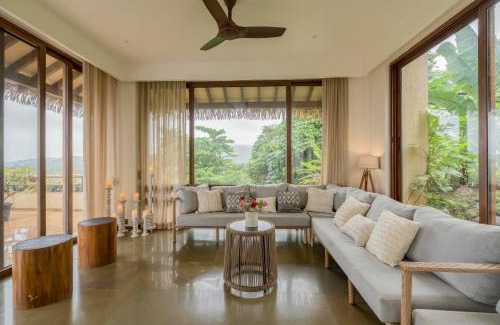Quepem House | Master Bedroom with Jacuzzi in a Villa hosted by Masaya Stays