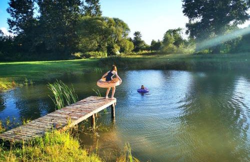 Wydminy House | Mazurskie Klimaty - niezależny, ogrodzony apartament z werandą