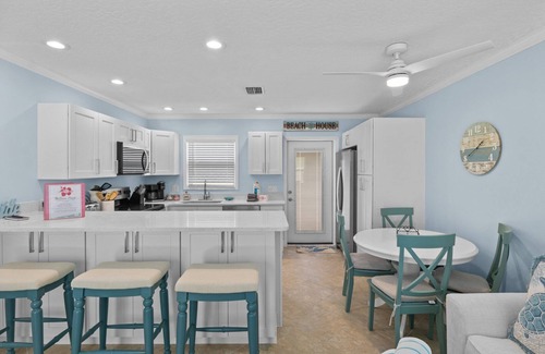 Anna Maria House | McBean Point: Dog Friendly! Walk to Bean Point! by Anna Maria Life Vacation Rentals