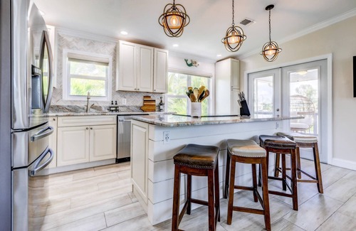 Big Coppitt Key House | Mermaid Hideaway: Charming 2BR Canal Front Home with Pool, Tiki, Dockage, and Dog-Friendly Amenities