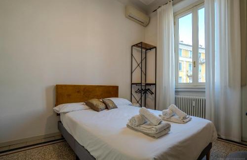 Isola del Bosco - Delle Corti Apartment | Metro Elegance Home Spazi Ampi e Charme Urbano