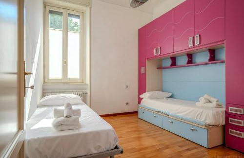 Isola del Bosco - Delle Corti Apartment | Metro Elegance Home Spazi Ampi e Charme Urbano