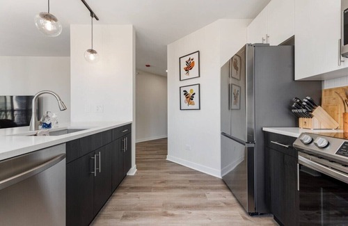 Rush and Division Apartment | Michigan Ave 2BR: Balcony, Exclusive Access