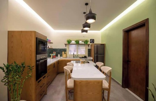 Al Duqqi Apartment | Mid-Century Vibes. Modern Convenience. Casa Mayouie.