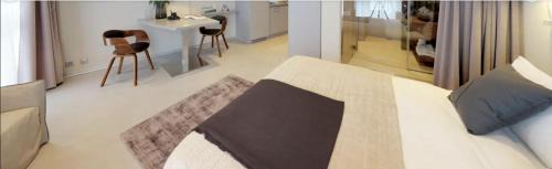 Saint-Sulpice Apartment | Mini studio avec cuisine, TV mural et sanitaires très confortable