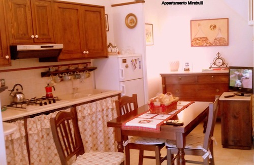The Trulli of Alberobello Apartment | Miratrulli Apartment, in the center of Alberobello, with panoramic views of the Trulli.
