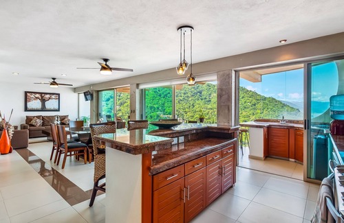 South Shore Hotel Area Condo | Mismaloya Beach condo with ocean views, on-site pool, grill, & private balcony