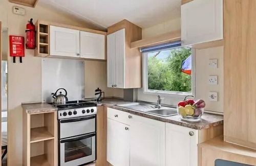 Guerard House | Mobil-home | Classic | 2 Ch. | 4 pers. | Raised terrace | A/C