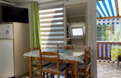 Les Moutiers-en-Retz RV Rental | Mobile Home 'Mobil-home Kapa - Proche Mer' with Shared Pool, Private Terrace and Private Garden