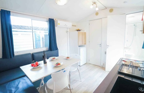 Arborea House | Mobilehome with air conditioning, pool and semi-covered wooden terrace