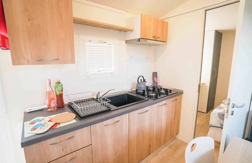 Arborea House | Mobilehome with air conditioning, pool and semi-covered wooden terrace